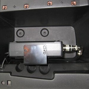 Main unit mounted in center glovebox. There is plenty of airflow to keep unit cool.