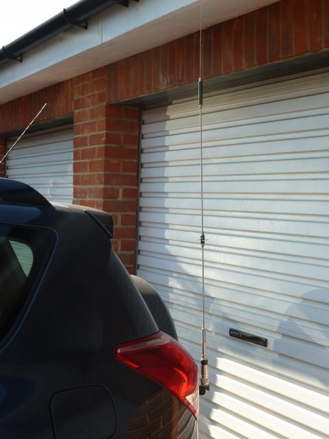 Diamond NR-790 144/430 MHz mobile antenna fitted to rear door of the RAV4. I cut the lip off a Diamond DPK-TR antenna mount so that the door will open