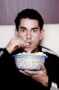 3240092_com_3192526_man_eating_popcorn_while_watching_movie.jpg 3240092_com_3192526_man_eating_popcorn_while_watching_movie.jpg