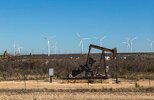 oil-field-and-wind-turbines-3009292476.jpg