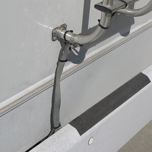 Ladder ground to frame.