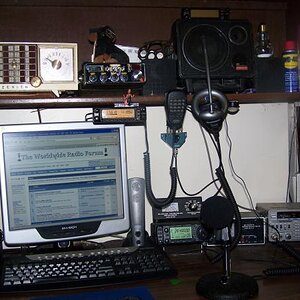 Desk of stuff.

Zentith AM clock radio, Uniden PC66XL, Icom IC706MKIIG, Kenwood TS430S, Yaesu FT 8100, MFJ meters.