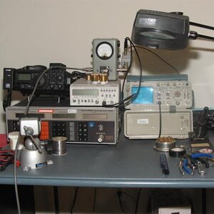 Tech bench: small but effective.  Marconi 10khz - 520Mhz signal generator, Fluke PM6666 1.3GHz Frequency couter, Tektronix  2336 100Mhz O-scope, Bird 