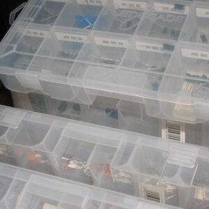 The file cabinets are filled with these well organized & labeled boxes of resistors, caps, diodes, transistors, etc.