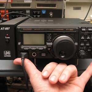897D with LDG at-897 auto tuner attached.  Note the size of the face of the radio compared to an average sized hand