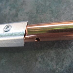 Split boom with copper insert