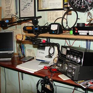 Side view of my latest arrangement.....
Icom ID-880H with Heil HM-ic Mic on a Heil short boom....
Kenwood TS-130S with Heil GM-5 on goose neck...