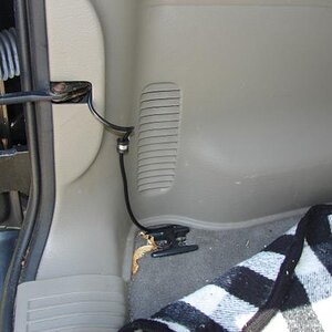 The hinge opening at the rear door gave me a convenient place to fish the coax out and run it to the dash....