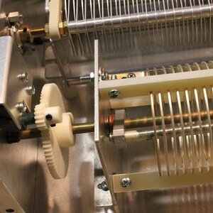 Gear drive on the inductor for the turns counter