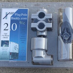 Flag Pole Buddy attaches to the RV ladder