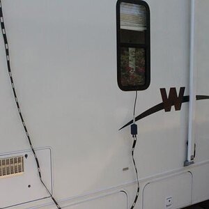 Ladder line to a 1:1 current balun to a short piece of coax attached to the LDG AT-897 tuner.