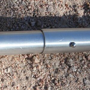 Boom with spring loaded preset stops