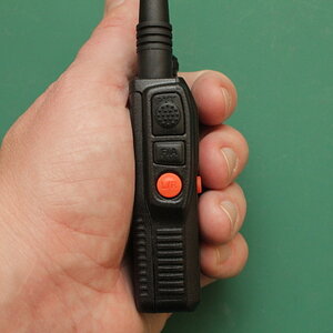 Baofeng UV-3R sideways in the hand