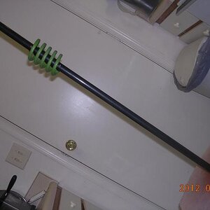 Glow Beast, 24" bottom shaft. Coil is "Lime Ice" color with glow in the dark clear coat. Main shaft is "Black Ice".