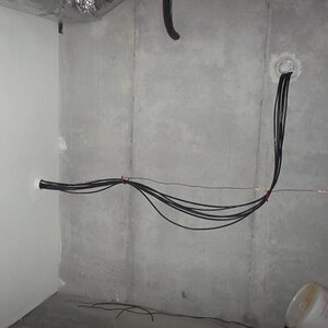 Cable entry into home via 4 inch conduit then through outside shack wall.