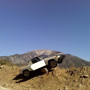 My buddy Robert's Rotary-powered 914. Crashed it on Glendora Mountain Road ... OUCH. 

Almost a shear cliff over the edge there ... them big boulders 