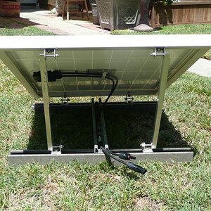 The rack assembly I fabricated for the 40-watt panel (x2).

Racks were fabricated using left over scrap materials. Bases are fiberglass UniStrut, cros