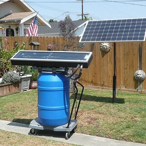 ... and here's the PV panel mounted. I'll buy a 10' stick of 1.1/2" EMT to get it a little higher up in the air (my wife has bumped her head on this t