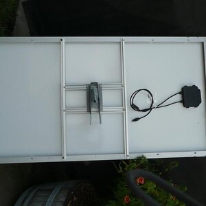 I wanted a tilt-able/rotatable pole mount for the solar water heater's 24 volt PV panel, so I used some scrap aluminum and the mount from an old DSS d