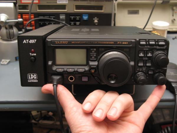 897D with LDG at-897 auto tuner attached.  Note the size of the face of the radio compared to an average sized hand