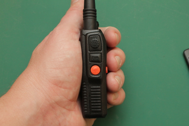 Baofeng UV-3R sideways in the hand