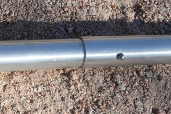 Boom with spring loaded preset stops