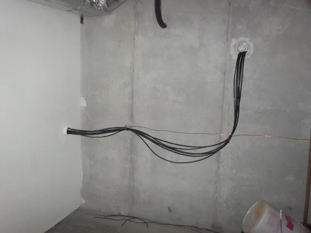 Cable entry into home via 4 inch conduit then through outside shack wall.