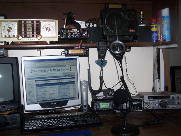 Desk of stuff.

Zentith AM clock radio, Uniden PC66XL, Icom IC706MKIIG, Kenwood TS430S, Yaesu FT 8100, MFJ meters.