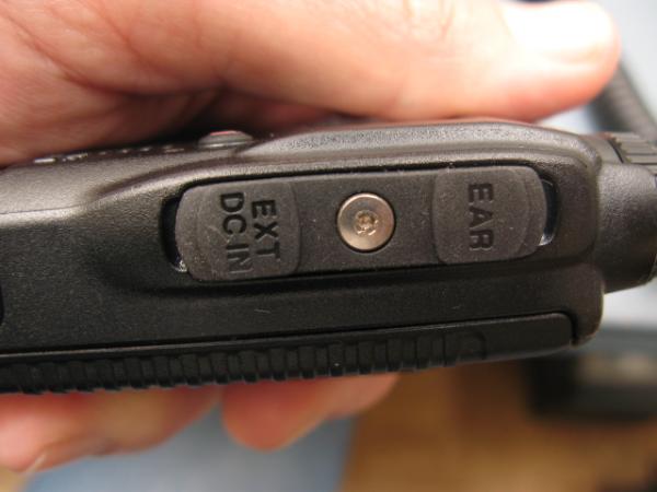 Earpiece and charger plug rubber cover is screwed in