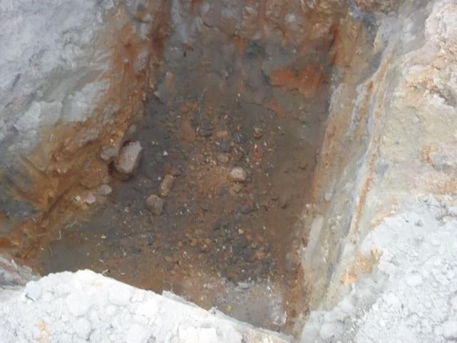 excavated hole for tower base