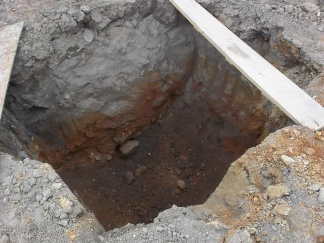 excavated hole for tower base