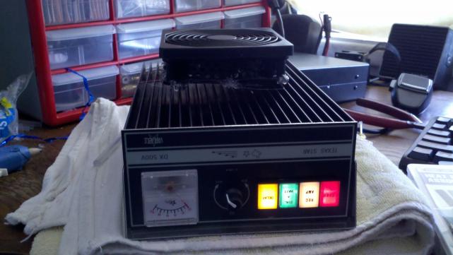 fan being used is rated at 13.8vdc, 70 CFM. loud but keeps the transistors much cooler.