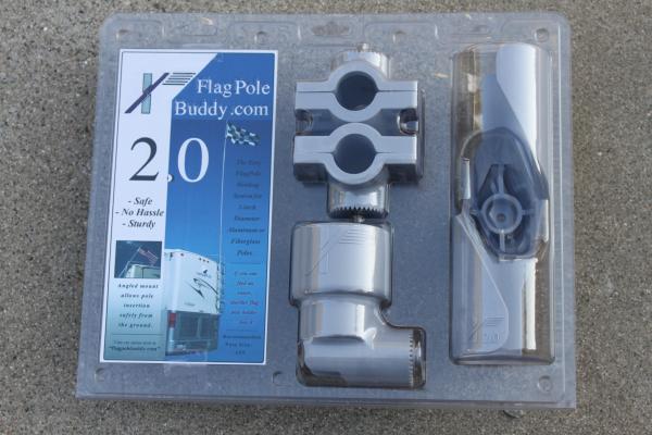 Flag Pole Buddy attaches to the RV ladder