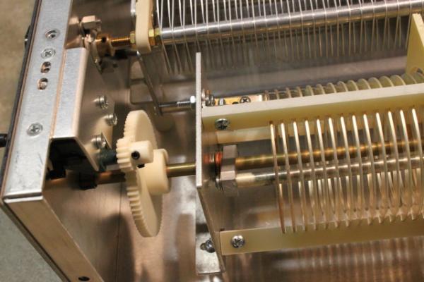 Gear drive on the inductor for the turns counter