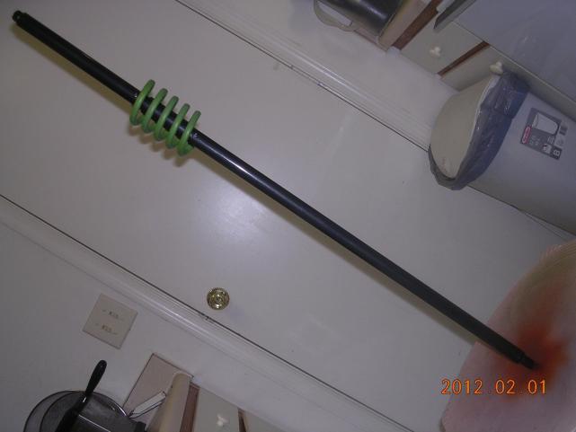 Glow Beast, 24" bottom shaft. Coil is "Lime Ice" color with glow in the dark clear coat. Main shaft is "Black Ice".