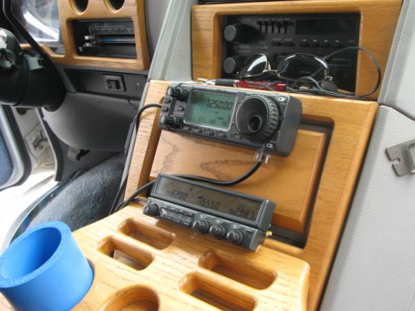 Gordon West radios on dash of van