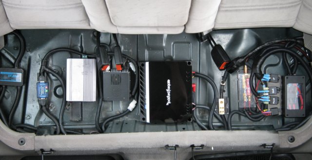 Hidden stuff under the back seat:

Duplexer, TinyTrak3+, 300W inverter, FT-90R "brains," 200W stereo amplifier, ground block, fuse block, power relays
