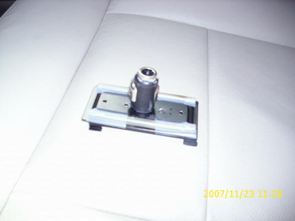 I took an old cell phone charger and cut the 12v cigarette adapter off of it. The center conductor "+" was removed and the inside was filled with epox