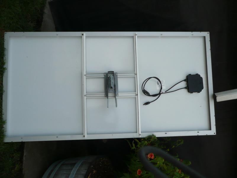 I wanted a tilt-able/rotatable pole mount for the solar water heater's 24 volt PV panel, so I used some scrap aluminum and the mount from an old DSS d