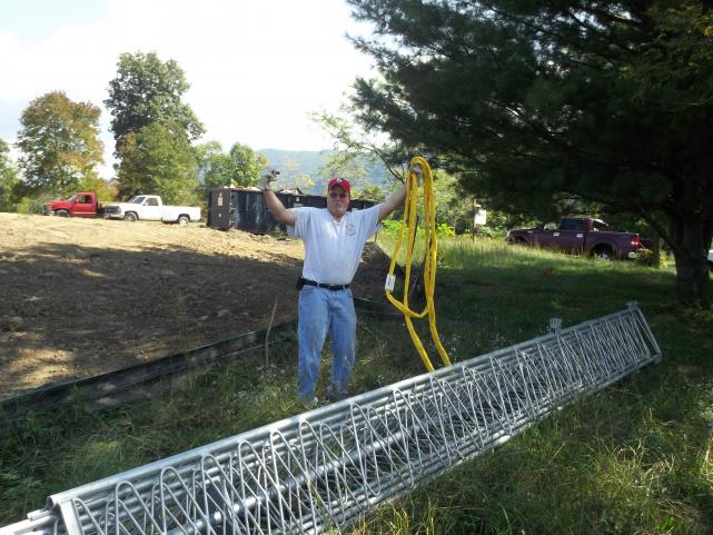 John KI4QEO celebrates off load of tower. Thanks for the help John!