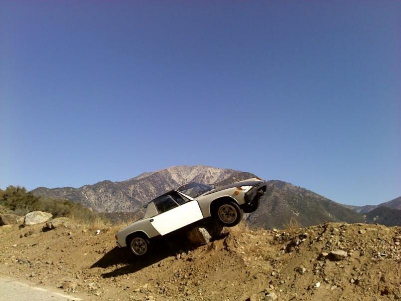 My buddy Robert's Rotary-powered 914. Crashed it on Glendora Mountain Road ... OUCH. 

Almost a shear cliff over the edge there ... them big boulders 