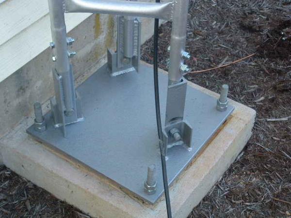 My home made tilt base, very strong and over kill but tower is still free standing after ice and winds. 36ft to feed point of Maco 5/8.