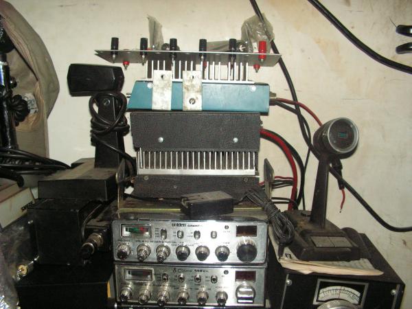 My radio stack in the radio shack.  There is a GrantXL, CObra 148GTL, some liears, and the corner of a Siltronix VFO for a SBE Console II - and the SB