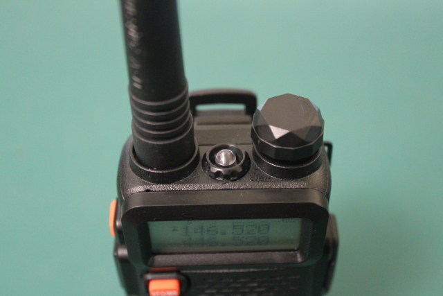 On/Off/Volume, flashlight, and antenna