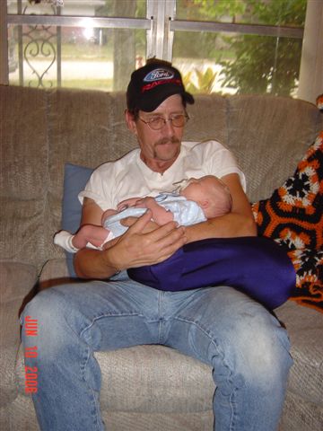 Pictures153birddog,Rick when we brought jacob home for first day