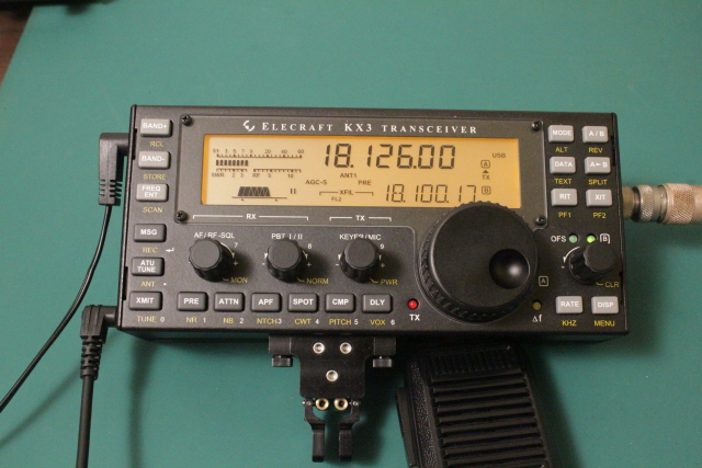 Radio face with key, mic, and antenna attached