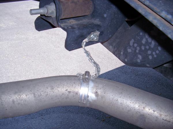 Rear tail pipe to frame.