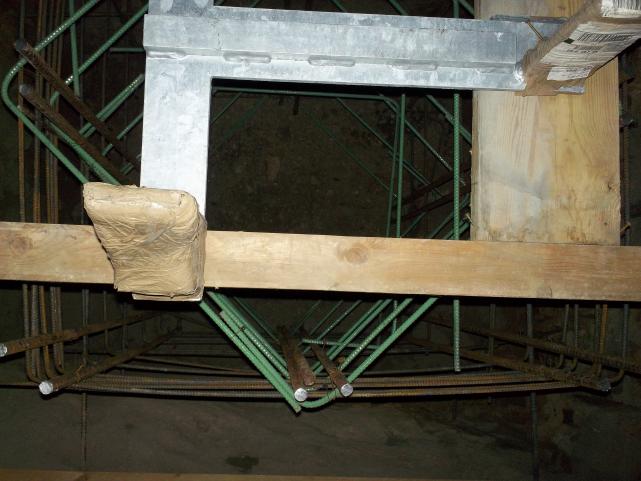 rebar cage with base suspended over