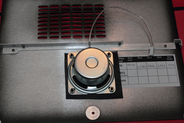 Speaker mounted to top cover