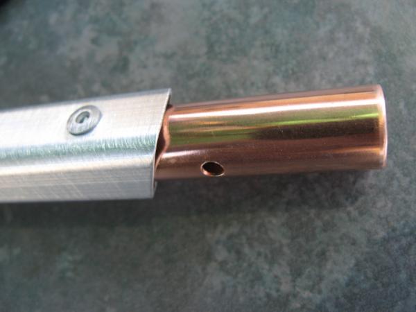 Split boom with copper insert
